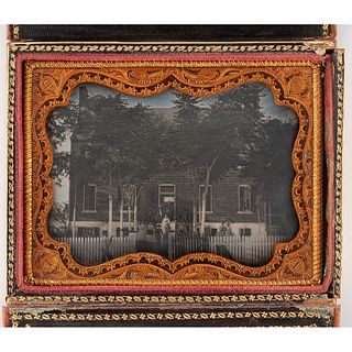 [AFRICAN AMERICANA] -- [DAGUERREOTYPE]. Quarter plate daguerreotype of white family and African American boy posed outside Southern home. N.p., n.d.