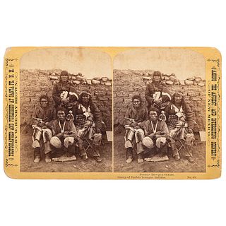 [NATIVE AMERICAN]. BROWN, W. Henry (1844-1886), photographer. Stereoview of group of armed Tesuque warriors. Santa Fe: [1870-1875].