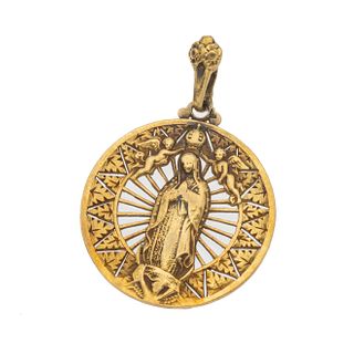 Medalla en oro amarillo de 14k. Imagen de la Virgen de Guadalupe. Peso: 7.3 g.