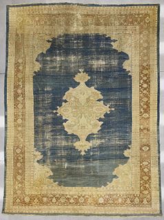 Early Oriental Carpet with Blue Field