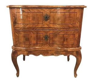 An Italian Ebony and Inlaid Continental Commode