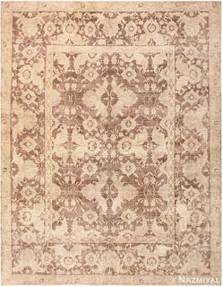ANTIQUE SOFT AND MUTED INDIAN AGRA CARPET. 11 ft 8 in x 9 ft 2 in (3.56 m x 2.79 m).