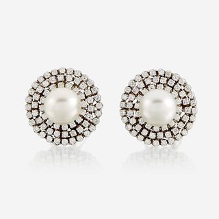 A pair of cultured pearl, diamond, and eighteen karat white gold earrings