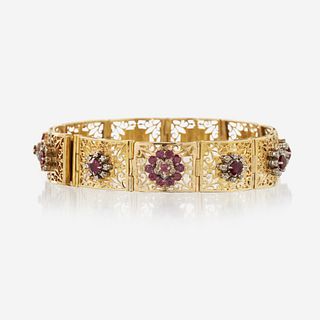 A ruby, diamond, pink sapphire, and eighteen karat gold bracelet