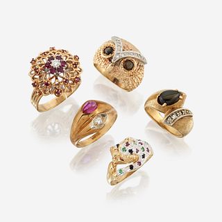 A collection of five fourteen karat gold and gem-set rings