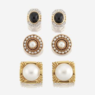 A collection of three pairs of gold and gem-set earrings