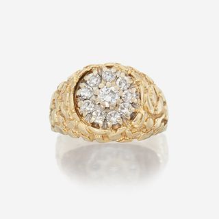 A fourteen karat gold and diamond ring