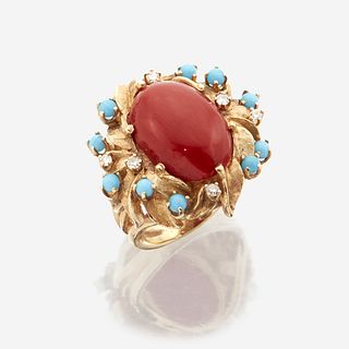 A coral, diamond, and fourteen karat gold ring