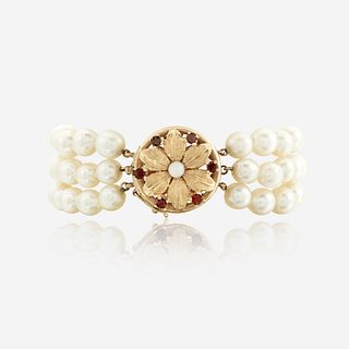 A cultured pearl, fourteen karat gold, garnet, and opal bracelet