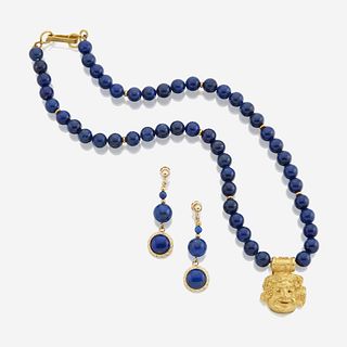 A lapis lazuli and gold necklace with similar ear clips