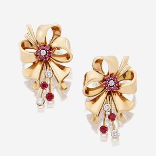 A pair of Retro eighteen karat gold and diamond earrings