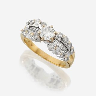 A diamond and eighteen karat two tone gold ring