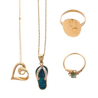 A Collection of Rings & Necklaces in Gold