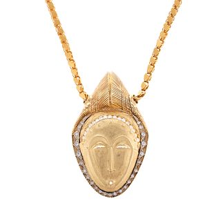 A Substantial 18K Mask with Diamonds on Chain