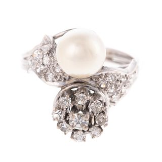 A Mid-Century Pearl & Diamond Bypass Ring in 18K
