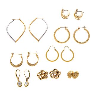 A Collection of Eight Pairs of 14K Gold Earrings