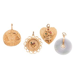 A Collection of 14K Disc Charms