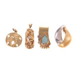 A Collection of Pendants & Charms in 14K
