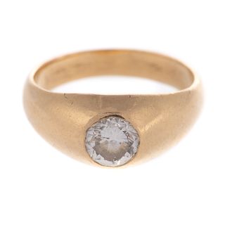 A Gypsy-Set Diamond Ring in 14K Yellow Gold