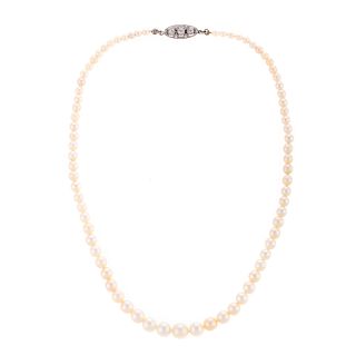 An Edwardian Pearl Necklace with 18K Diamond Clasp