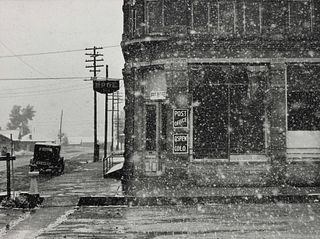 Marion Post Wolcott
(American, 1910-1990)
A group of five photographs (A member of the Wilkins Family Making Biscuits, 1939; Post Office in Blizzard, 