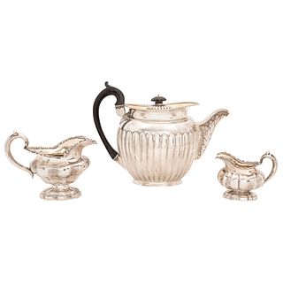 LOT OF TEAPOT AND PAIR OF CREAM JUGS RUSSIA, 19TH CENTURY RUSSIAN SILVER 5.9" (15 cm) maximum height Approximate weight: 999.4 g