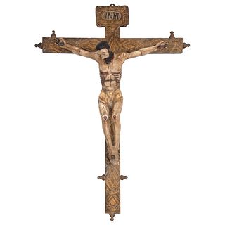 CRUCIFIED CHRIST MEXICO, 19TH CENTURY Gilded and polychrome wood carving. 41.7 x 31.8" (106 x 81 cm)