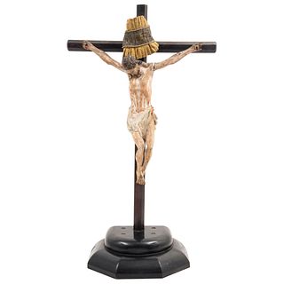CRUCIFIED CHRIST MEXICO, 19TH CENTURY Carved and polychrome wood, with composite base. 30.7 x 17.7" (78 x 45 cm)