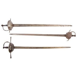 LOT OF THREE CAZOLETA SWORDS EARLY 19TH CENTURY Blades: 37.5" (95.5 cm) and 35.4" (90 cm)
