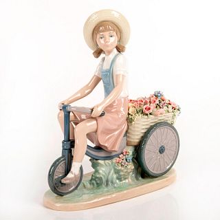 Girl with Flowers in Tow 01005031 - Lladro Porcelain Figurine