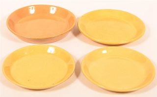 Four Various Yellowware Plates.