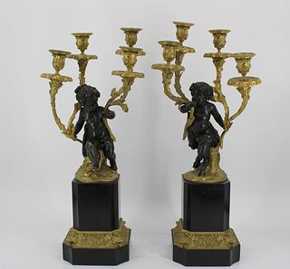 A Fine Pair Of Bronze & Gilt Bronze Candelabra.
