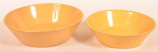 Two Yellowware Nappy Bowls.