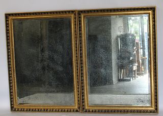 A Pair Of Carved Neoclassical Style Mirrors