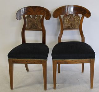 A Pair Of Biedermeier Chairs With Gilt Carved
