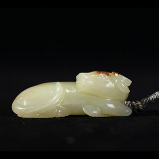 A YELLOW JADE MYTHICAL BEAST CARVING