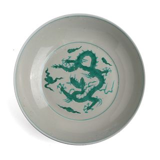 A GREEN AND WHITE DRAGON DISH 