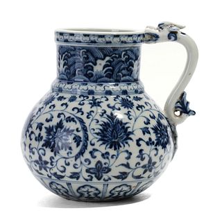A BLUE AND WHITE 'LOTUS' EWER