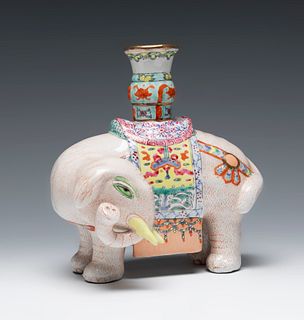 Candlestick in the shape of an elephant. China, 19th century.
Glazed porcelain.