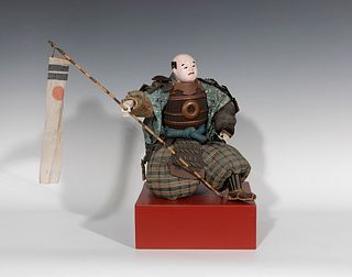 Samurai warrior figure; early 20th century.
Wood, natural pearl, body with fodder, clothing in fabric and leather.