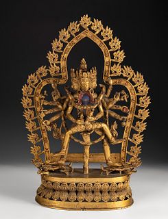 Trimurti. Yab-yum. India 18th-19th centuries.
Polychrome bronze and fine gold.