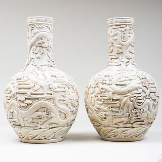 Pair of Chinese White Glazed Bottle Vases