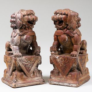 Pair of Chinese Polychromed and Parcel-Gilt Models of Buddhistic Lions