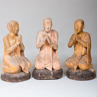 Set of Three Cambodian Carved Wood Figures of Kneeling Monks