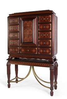 JOAN BUSQUETS I JANÉ (Barcelona, 1874 - 1949).
Noucentista arquilla cabinet, ca.1910-20.
Mahogany and walnut, marquetry in fruit woods and mother of p