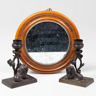 Pair of Small Bronze Lion Form Candlesticks and a Fruitwood Circular Mirror
