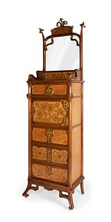 JOAN BUSQUETS I JANÉ (Barcelona, 1874 - 1949).
Auxiliary cabinet with mirror, ca. 1900.
In walnut wood, pyro-engraved marquetry, gilt brass fittings a