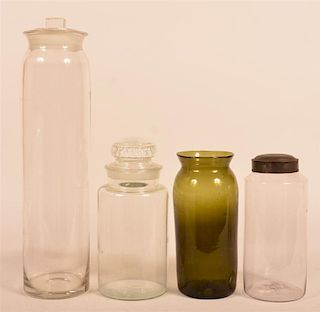 Four Various Blown Glass Canisters.