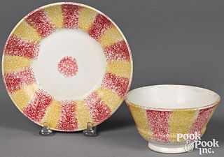 Red and yellow rainbow spatter cup and saucer