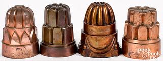 Four large copper food molds, 19th c., one inscrib
